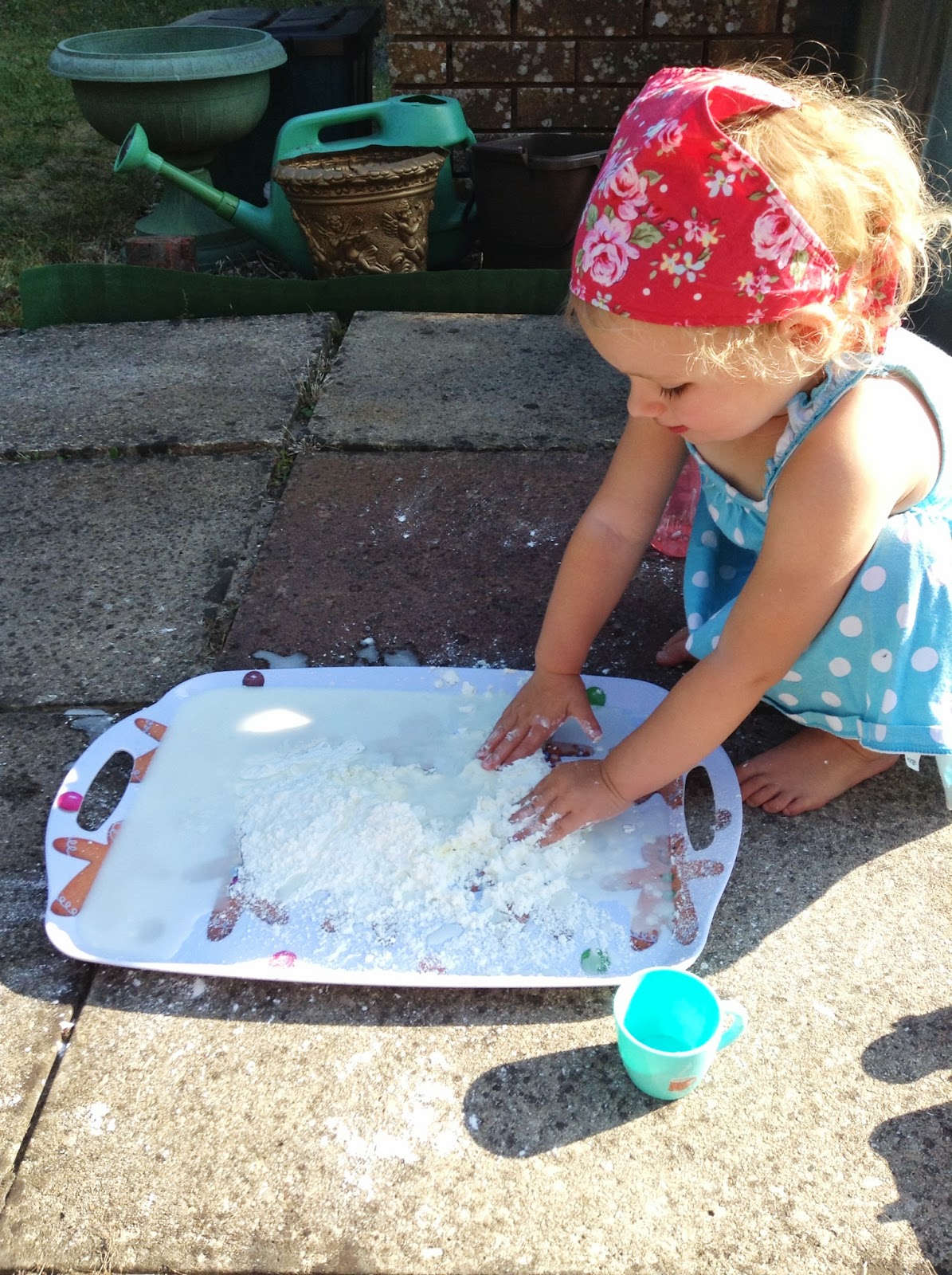 A cup of tea and chat Messy play.cornflour and water