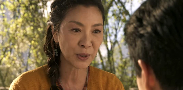 Ying Nan (Michelle Yeoh) teaches Shaun, her nephew, how to defeat his father in SHANG-CHI AND THE LEGEND OF THE TEN RINGS.