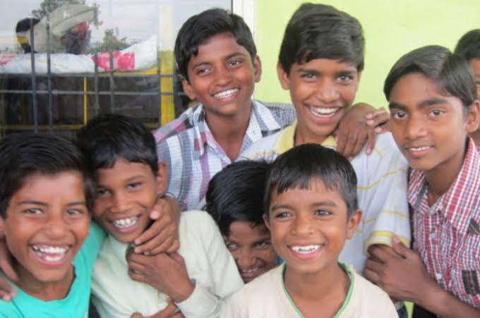 Orphan Assist uniof children smiling