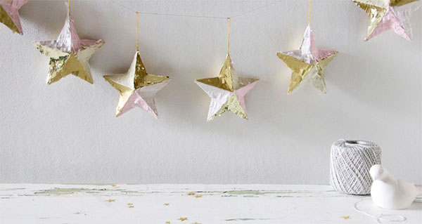 {holiday inspiration : stars and garlands and romance by candlelight}