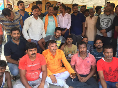 सड़क निर्माण के लिए वजीरगंज में सड़क जाम