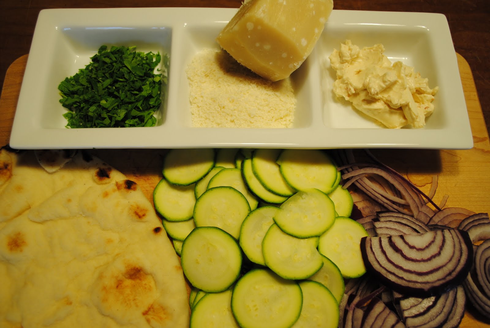 Poppyseeds and Tiger Lilies Zucchini and Red Onion on Naan Bread