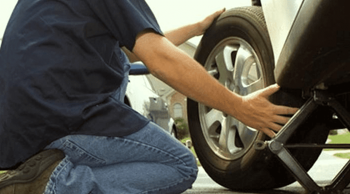 How to remove a flat tire that won't come off?
