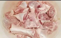Washing mutton pieces in water for mutton masala recipe