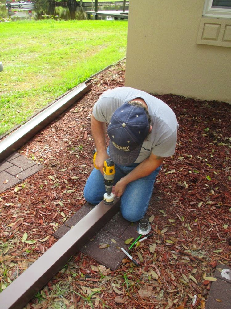Mike and Lisa's World New Gutters and A Granite Counter
