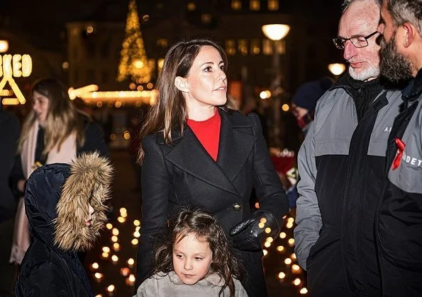 Princess Marie of Denmark, together with her children Prince Henrik and Princess Athena at Gammeltorv square