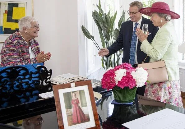 Princess Benedikte attended a lunch with the Danish Consul General in Flensburg. pearls earring and pearl necklace. Crown Princess Mary