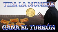 Tira la moneda. Gana el turrón. Juego de feria