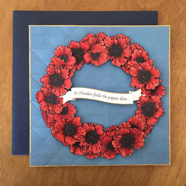 full front view of Memorial Day poppies wreath card with envelope.