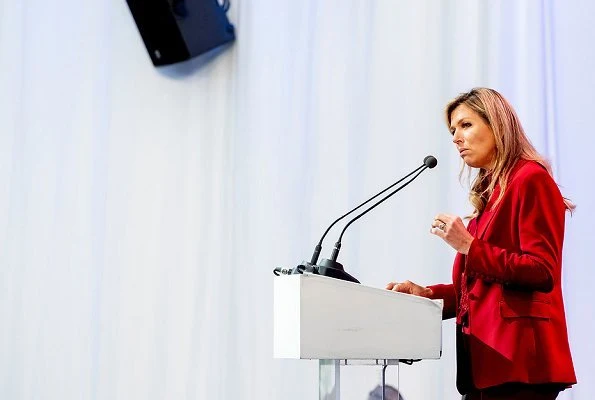 Queen Maxima wore a red blazer and trousers by Claes Iversen, and red blouse by Claes Iversen, with her L.K. Bennett pumps. at trade conference
