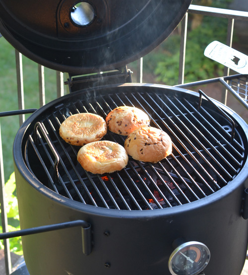 Toasting buns on the Oklahoma Joe's Bronco drum smoker.