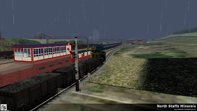 Fastline Simulation - North Staffs Minerals: A Class 10 0-6-0 diesel shunter prepares to haul loaded 24 1/2 ton coal wagons from Wolstanton Colliery Exchange Sidings across the mainline to Grange Sidings as Class 86 86260 passes with a down express to Manchester Picadilly in North Staffs Minerals a route for RailWorks Train Simulator 2012.