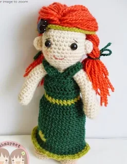 http://www.craftsy.com/pattern/crocheting/toy/yaprak-dress--saint-patricks-day-/10022