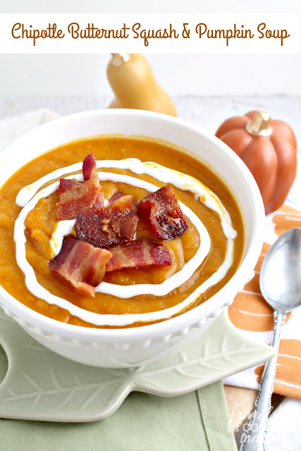 Roasted butternut squash & creamy pumpkin are blended together with warm spices & a little kick of heat in this perfect for fall Chipotle Butternut Squash & Pumpkin Soup.