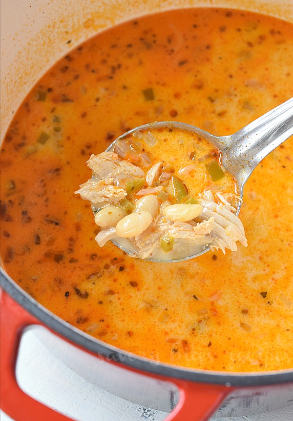 a dutch oven with creamy white bean chicken chili