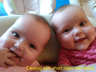 Text: Dealing with short naps with twins. Picture: two smiling twin girls heads touching