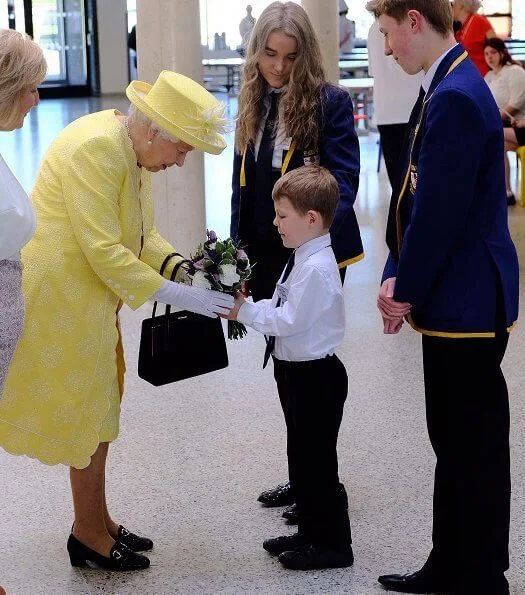 The traditional 'Ceremony of the Keys' took place tonight at Holyroodhouse in Edinburgh. yellow dress, jcoat and hat