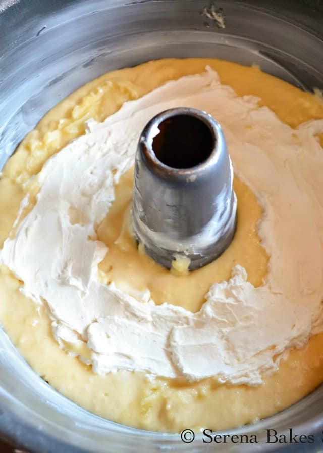 Top Cherry Coffee Cake Batter with Cream Cheese Filling. 