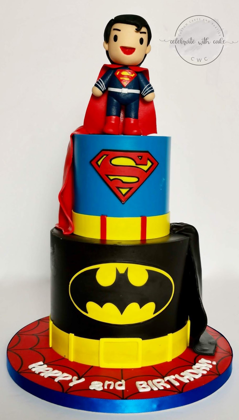 Dc superhero themed 2 tiered featuring Superman Cake