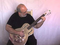 Graeme Whippy playing the guitar