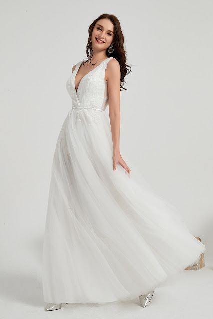 A-line sleeveless v neck white wedding gown