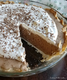 french silk pie with slice missing