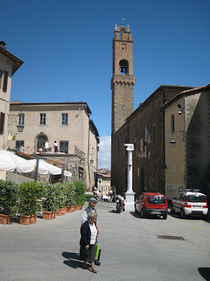 Montalcino piazza Garibaldi, theater (teatro degli Astrusi) and the old town hall (location of the tourist office)