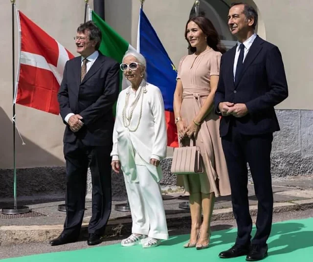 Crown Princess Mary wore a mimi old rose belted silk crepe dress by Marc Jacobs. Milan Design Week