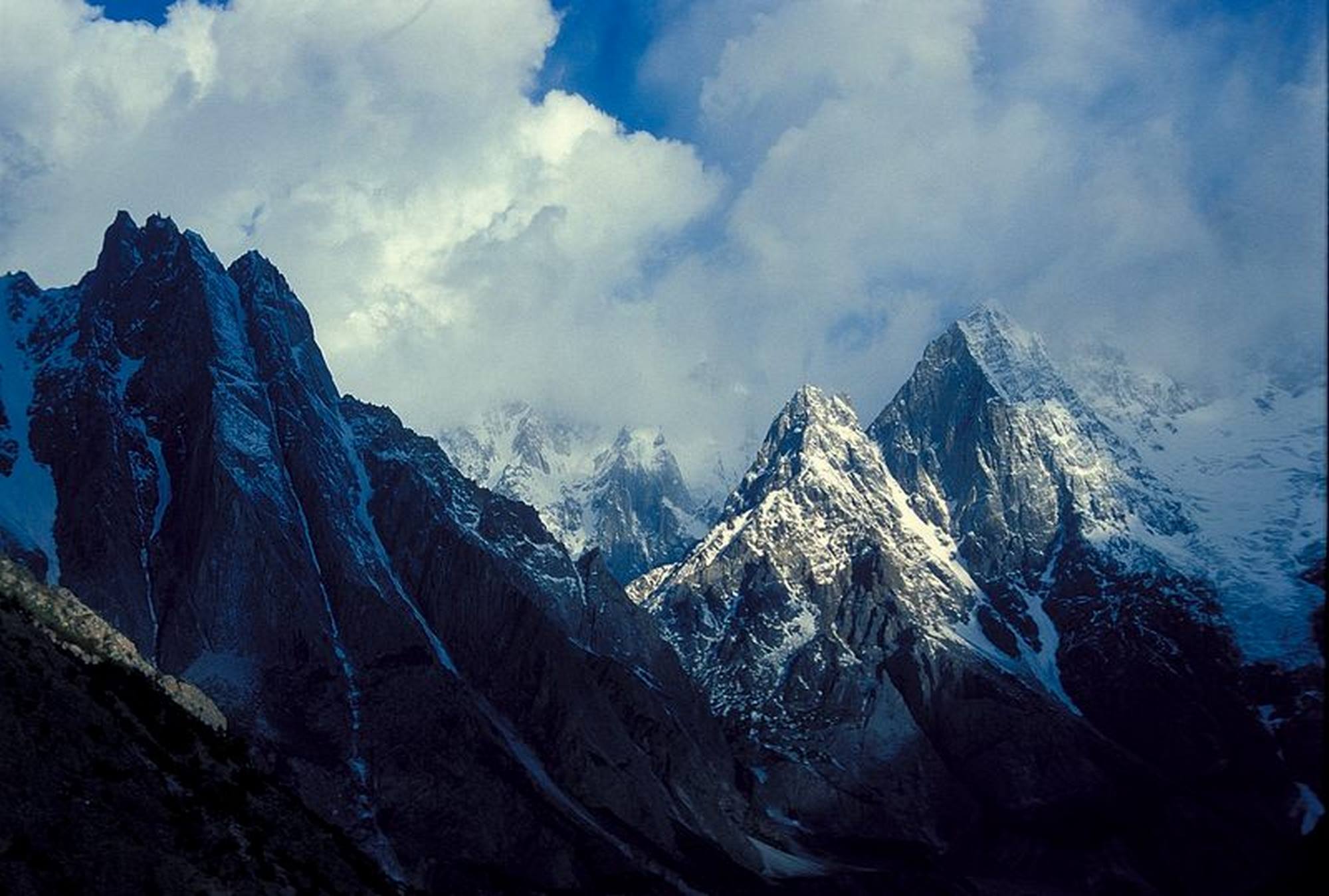 Peak in Nagar valley. South of Batura Sar Muchuhar peak in center Gutum Talji (left) and Pute Tower III (right) Karakoram Range Pakistan Hunza & Nagar valley