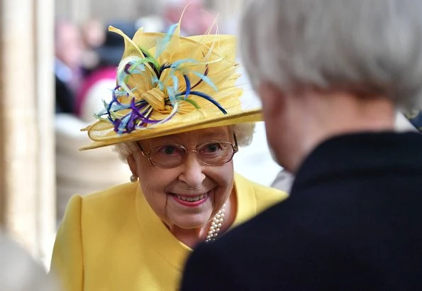 Queen Elizabeth II accompanied by Princess Eugenie of York, attended the Royal Maundy Service. Erdem Bernette floral print silk dress