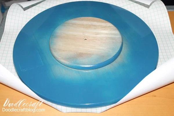 Cut a piece of vinyl the size of the Lazy Susan and trace around it on the backside of the vinyl.