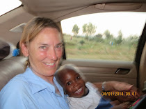 Valerie M and Anotidalshe Chiweshe ("God Is With Us") on road to Masvingo, Zimbabwe