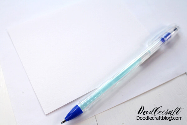 Use the Tombow Glue pen as a resist to create stars and dots on the paper to begin.