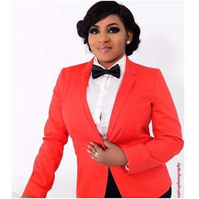 mide martins in suit