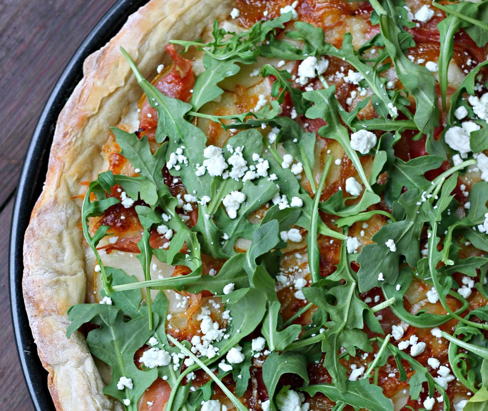 Pear, Prosciutto, Arugula, Caramelized Onion & Goat Cheese Pizza