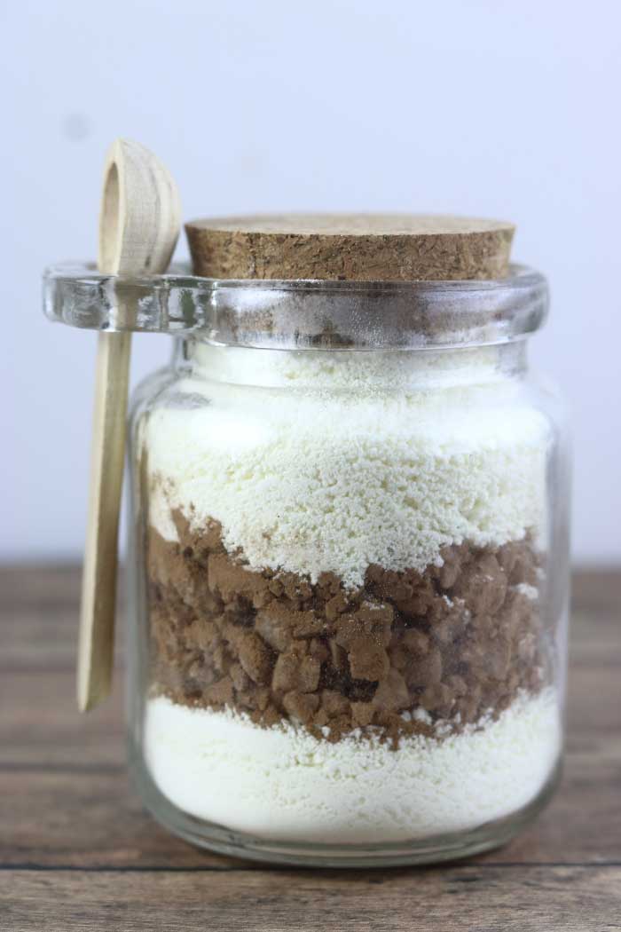 Can’t decide between a milk bath diy and diy bath salts?  Make both!  This hot chocolate milk bath salts recipe is a diy milk bath and a bath salts homemade in one.  Make your own bath salts to moisturize your skin.  This homemade milk bath is great for dry skin.  This diy milk bath recipes uses natural ingredients that are easy to find.  In fact, you probably already have all of the ingredients for this milk bath recipe and diy bath salts at home!  #milkbath #diy #bathsalts #hotchocolate #diymilkbath #diybathsalts