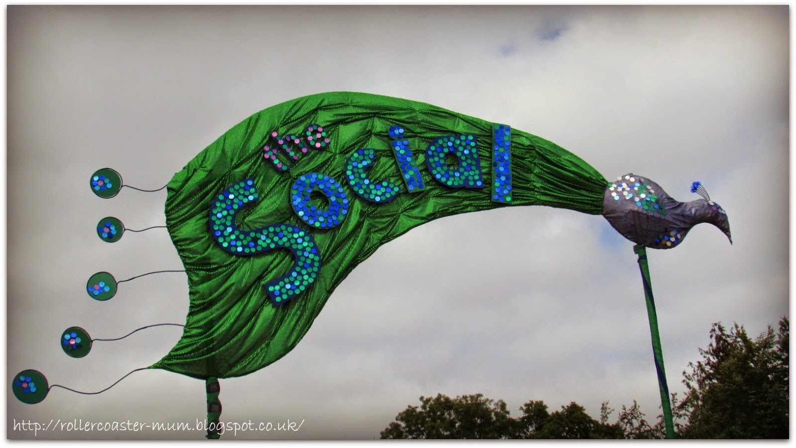 Peacock sign for the Social, Larmer Tree Festival