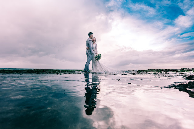 A couple at the beach with clouds reflecting off the wet sand. #clouds #relatable #beach #feelgood