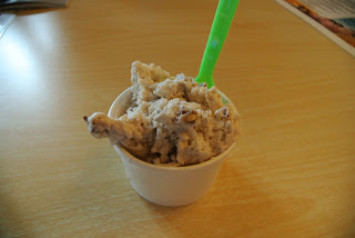 A cup full of ice cream.