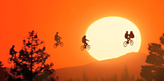 Schwinn bicycle floating in front of moon