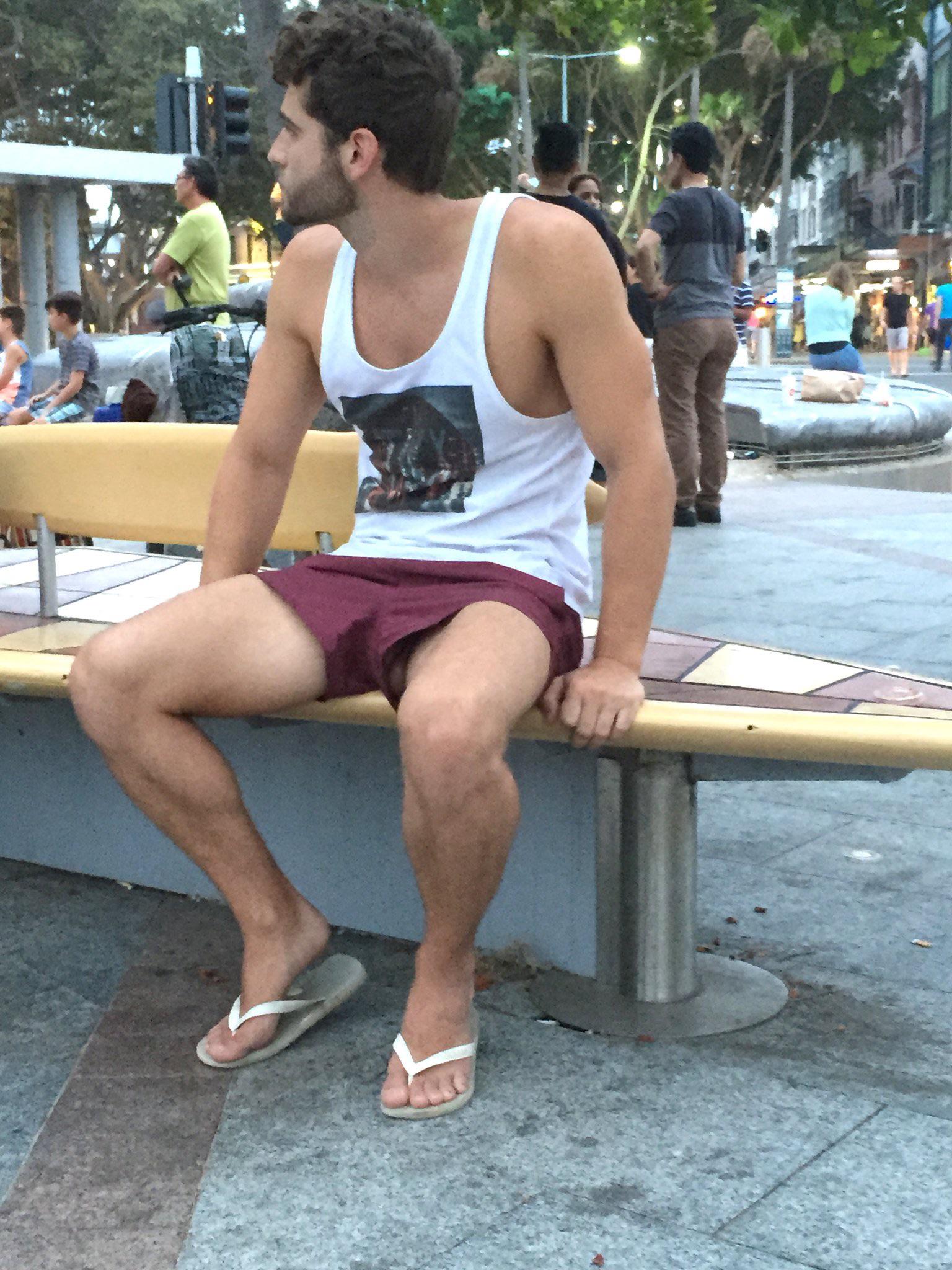 Mens dicks showing through shorts while sitting