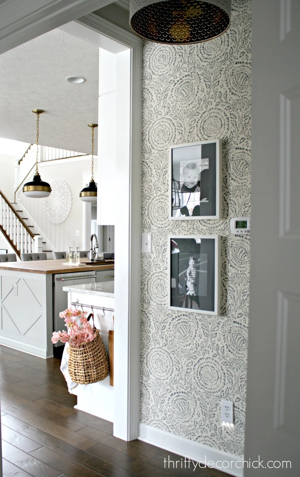 Small hallway makeover with white and blue floral wallpaper