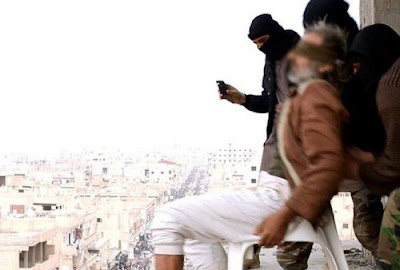 ISIS militants throw gay man off 7-story building in Syria (file photo). ISIS militants throw gay man off 7-story building in Syria (file photo).