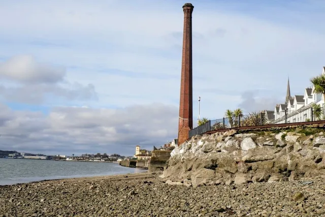 Cork to Cobh by Train: Historic chimney on the beach