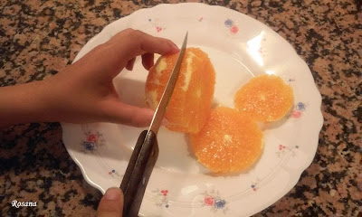 cortamos la naranja en rodajas