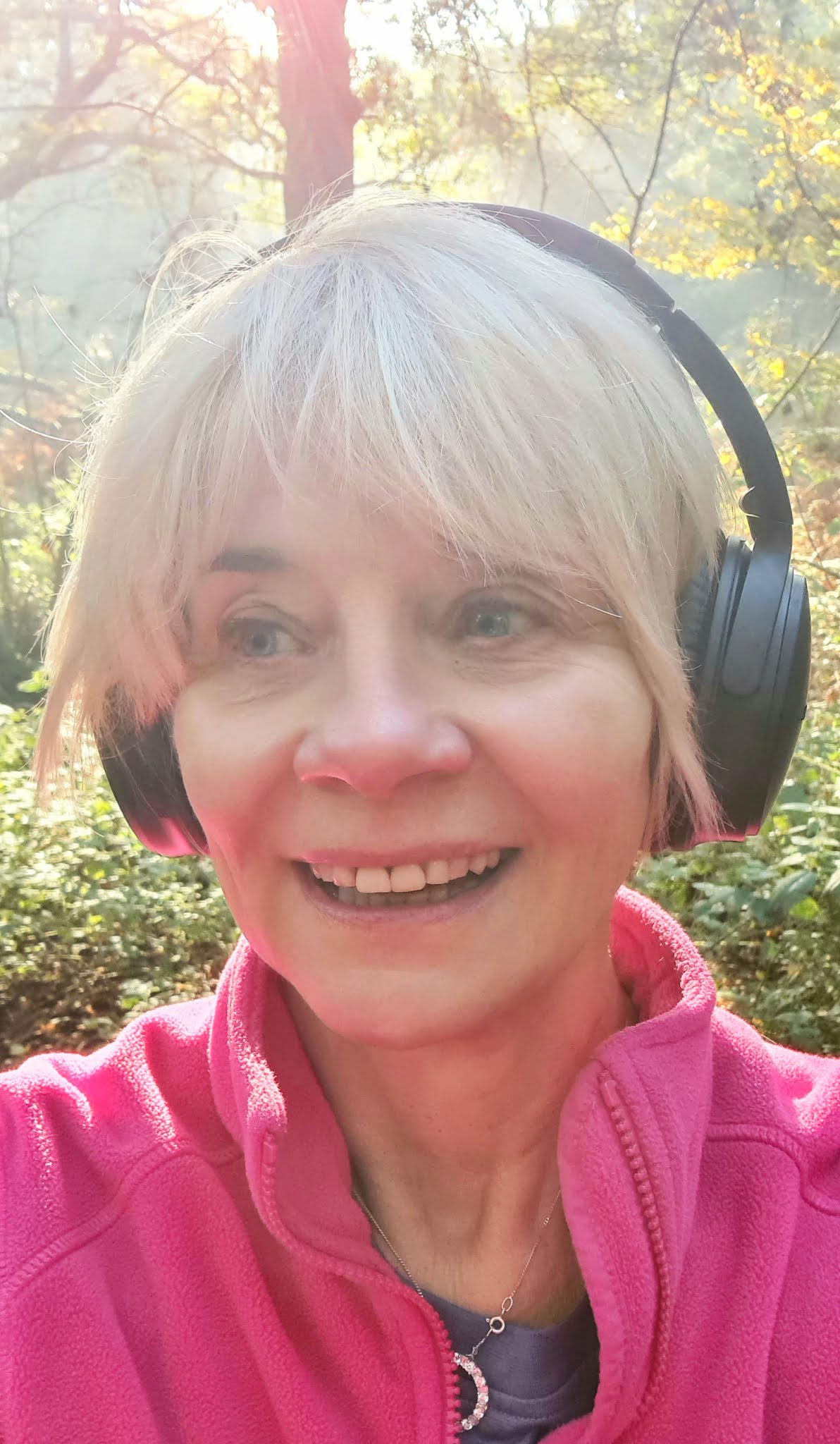Gail Hanlon from Is This Mutton walking in Epping Forest with her headphones and podcasts for company