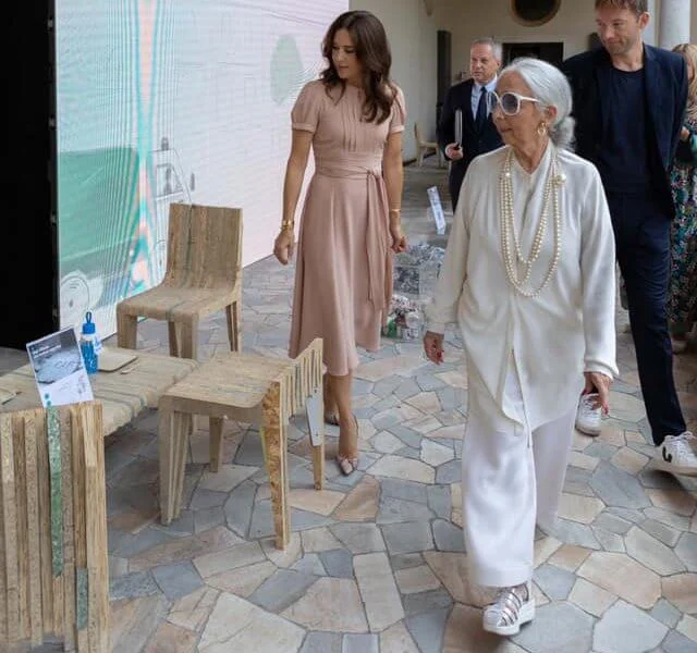 Crown Princess Mary wore a mimi old rose belted silk crepe dress by Marc Jacobs. Milan Design Week