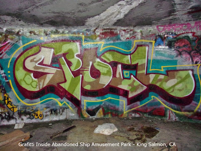 photo of graffiti in The Shipwreck an abandoned roadside attraction just South of Eureka in King Salmon