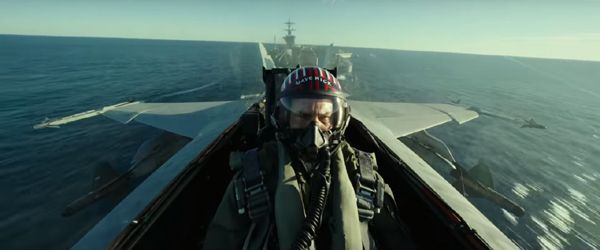 An F/A-18 Hornet piloted by Maverick (Tom Cruise) catapults off an aircraft carrier in TOP GUN: MAVERICK...which arrives in theaters on July 2.