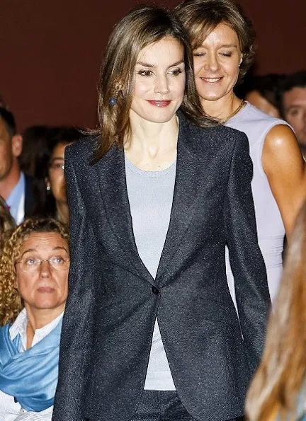 Queen Letizia wore Hugo Boss pantsuit, Magrit pumps, new season bag